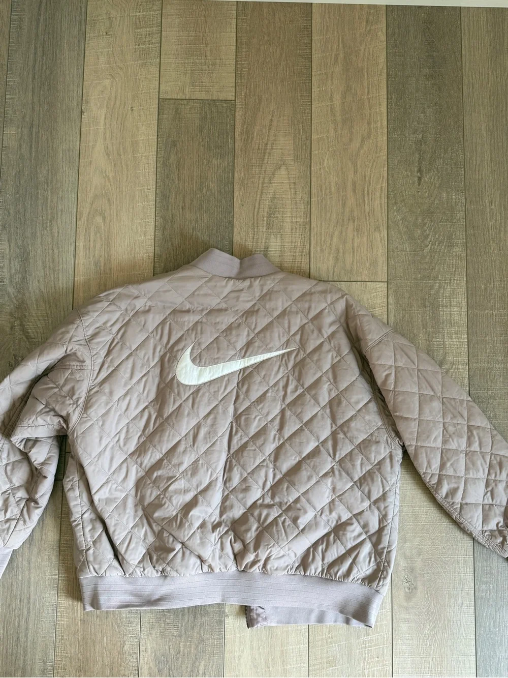 Nike Women's Quilted Bomber Jacket in Light Purple